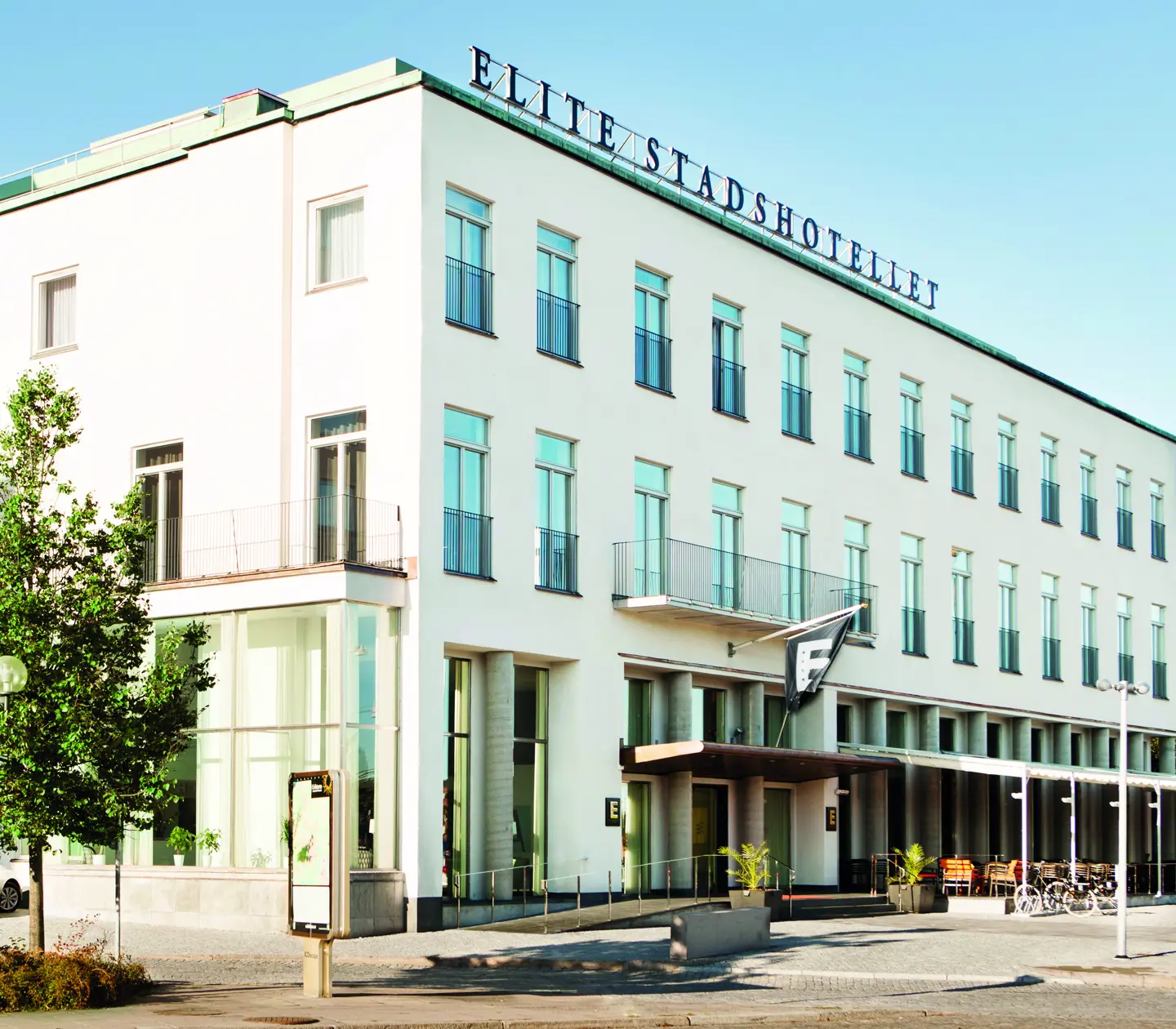 The grand facade of the Elite Stadshotellet with the Eskilstuna River in front