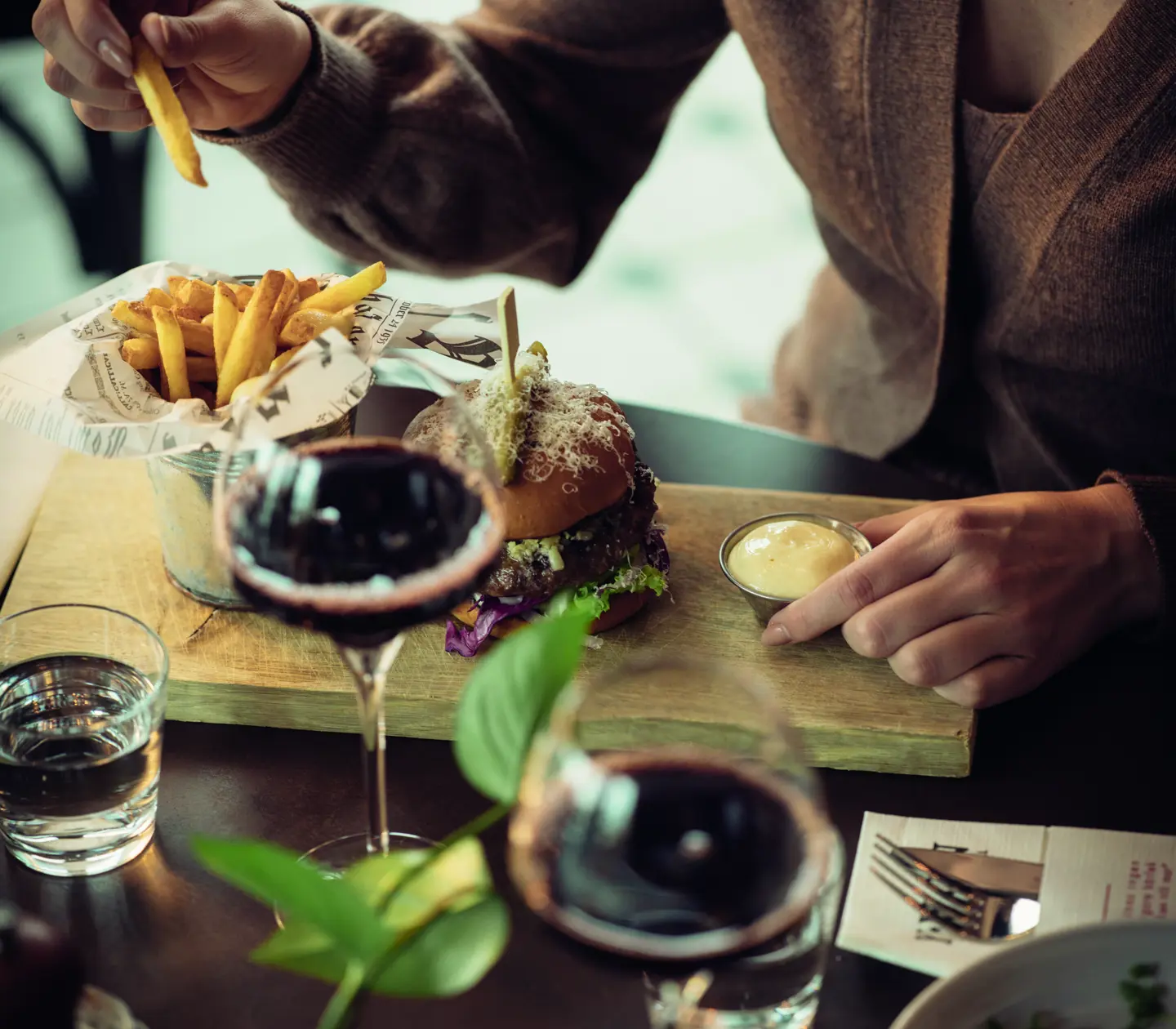 Vip with champagne, fruit and chocolate laid out on the table
