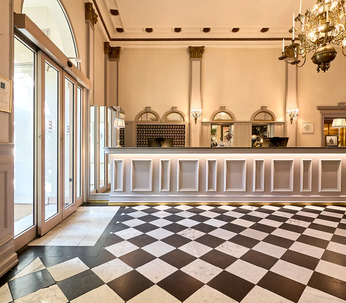 Bright reception desk with keys in the background