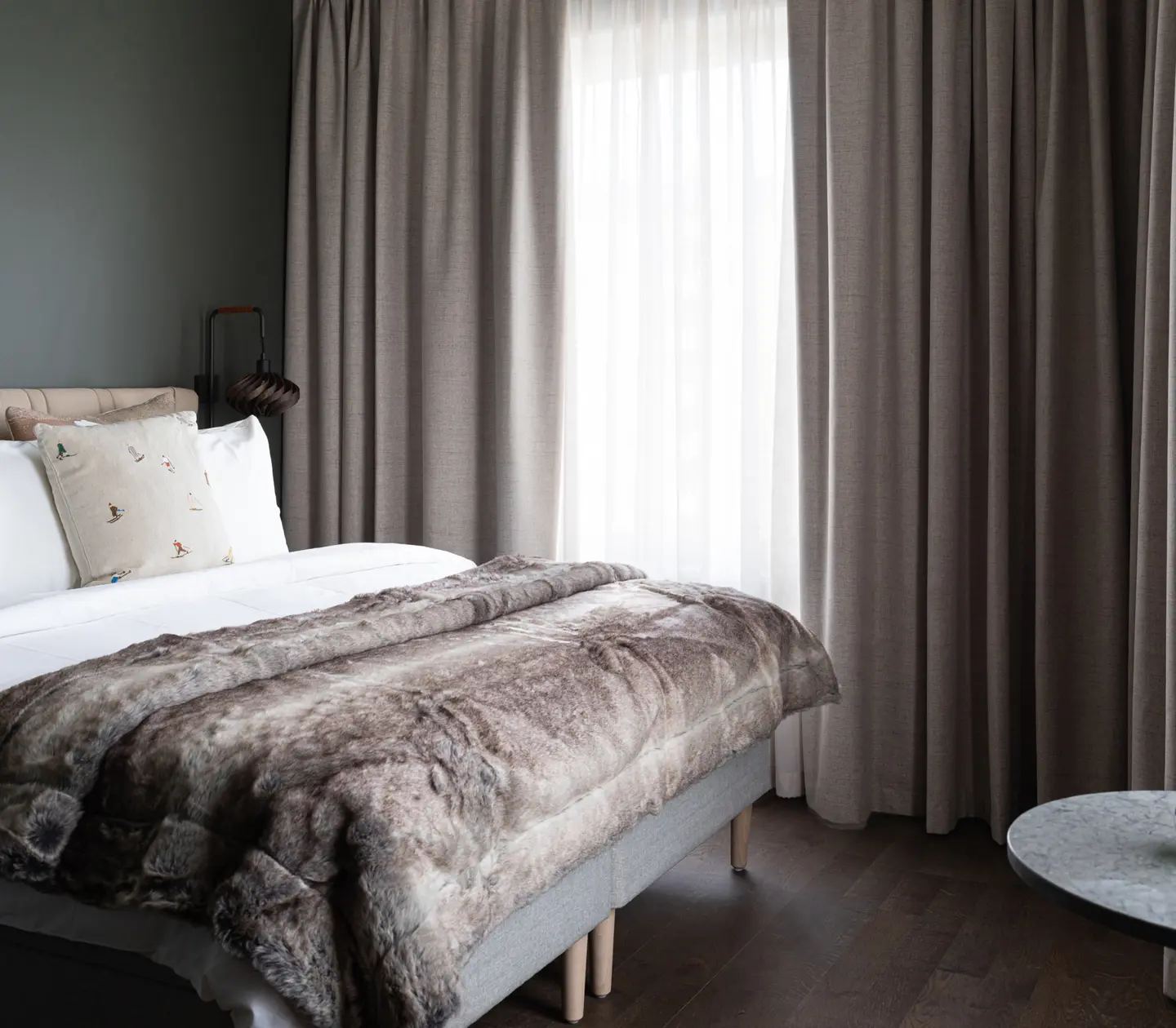 Made bed in a Standard room at Elite Hotel Frost.