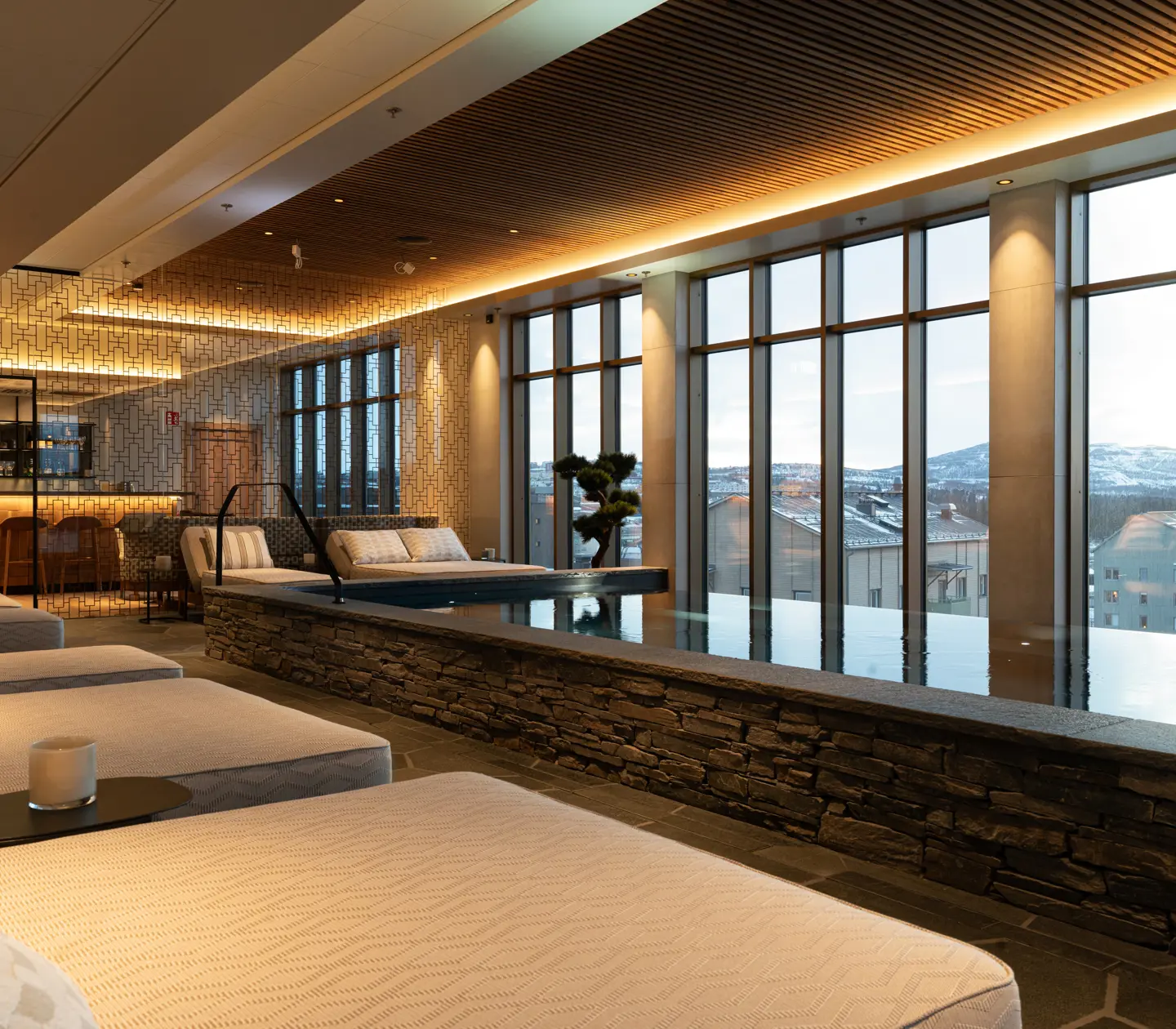 Large windows at Vana Spa offering views of the mountains.